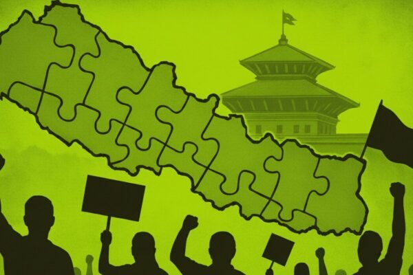 Nepal map breaking into puzzle pieces symbolizing political instability.